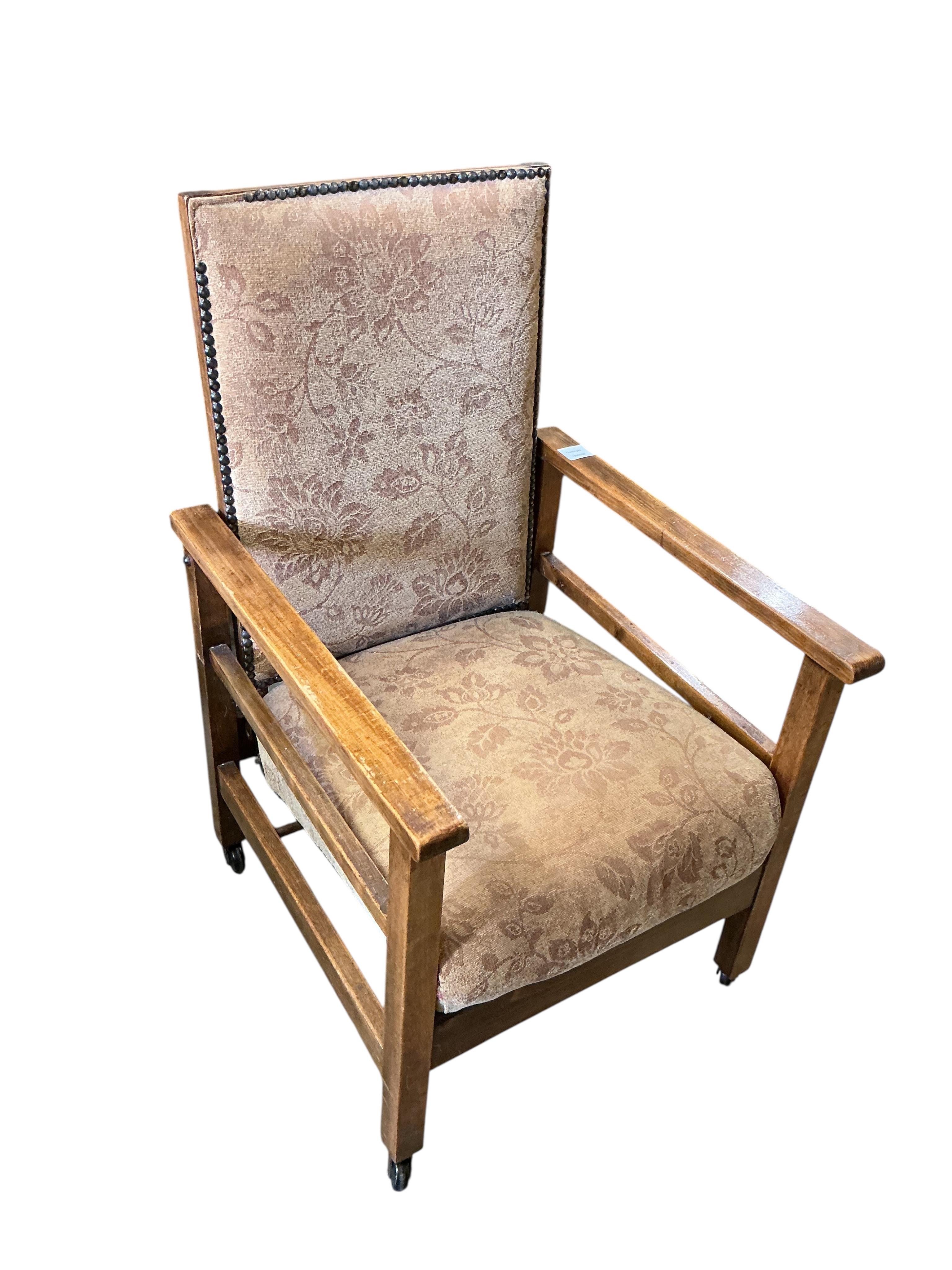 An early 20th century upholstered beech reclining armchair, width 54cm, depth 57cm, height 91cm
